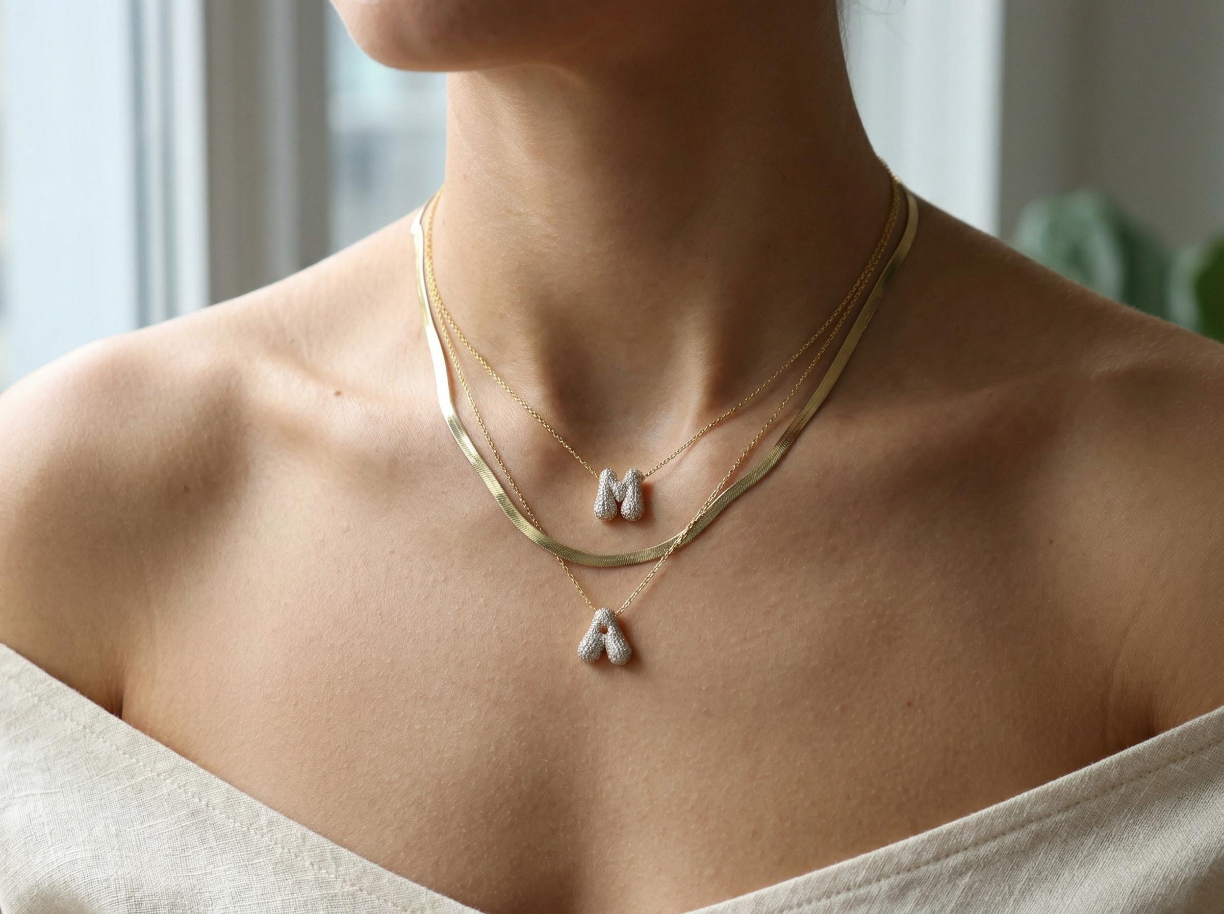 Layered gold necklace with 3D bubble initial letter M